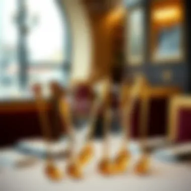 Display of gold espresso spoons in an elegant dining setting