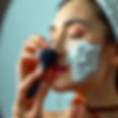 User applying an electric exfoliating brush on the face