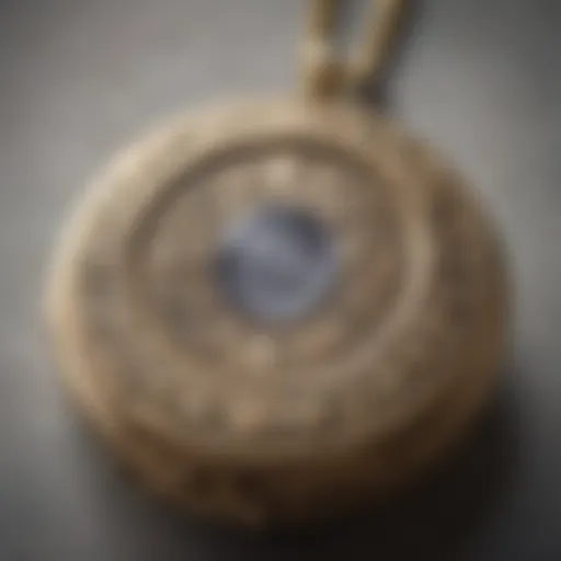 A close-up view of a vintage locket displaying intricate engravings