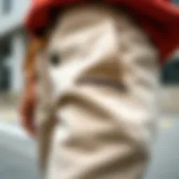 A close-up view of button-up sweatpants showcasing unique design elements.