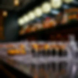Elegant arrangement of clear plastic cocktail glasses on a table.