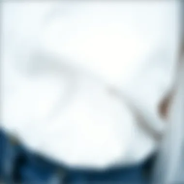 Close-up of high-quality fabric used in white tops, highlighting texture and detail.