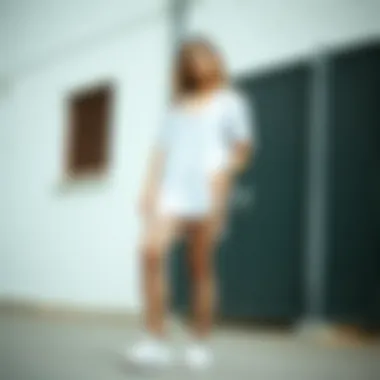 Casual outfit featuring short fishnet leggings and sneakers