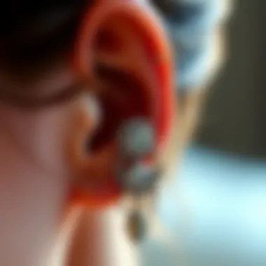 Elegant Vertical Tragus Piercing Display Close-up of a beautifully styled ear featuring a vertical tragus piercing adorned with intricate jewelry