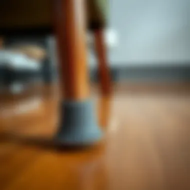 Elegant felt chair leg protector on a polished wooden floor