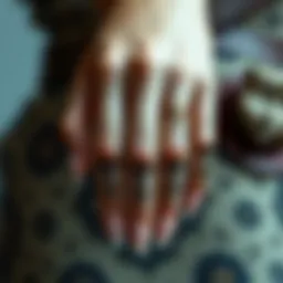 Detailed close-up of a realistic fake model showcasing intricate nail art design