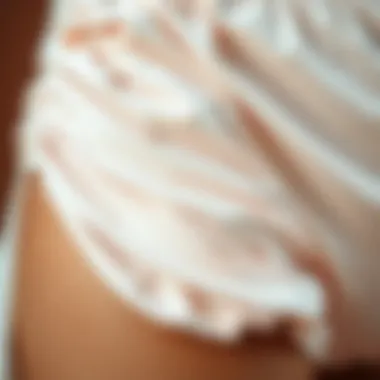 Soft and Stretchy Fabric of Retro Swim Bottoms Close-up of fabric texture showcasing the softness and stretch of swimwear