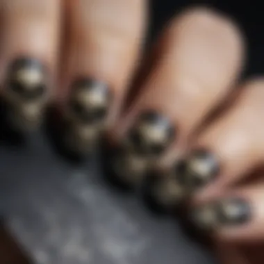 Close-up of a beautifully applied skull nail sticker on a polished nail