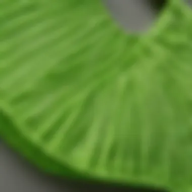 Close-up of the fabric texture of a fluorescent green bikini