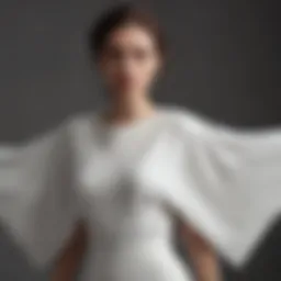 Elegant short sleeve batwing top showcasing unique draping