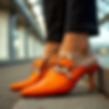 Design Features Unveiled Close-up of orange mules showcasing unique design details