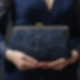 Elegant navy blue clutch with intricate detailing