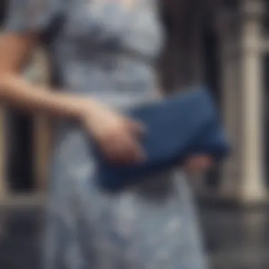 Stylish navy blue clutch paired with a chic dress